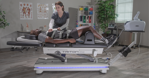 Comparison of the Effectiveness of Traditional Motorized Traction and Non-surgical Spinal Decompression Therapy Added to Conventional Physiotherapy for Treatment of Chronic Low Back Pain