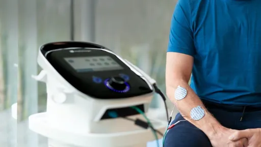 Intelect Legend 2 with Electrodes Placed on Male Patient's Arm