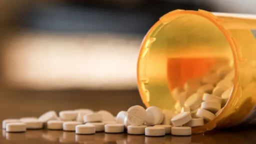 bottle of pills spilled over