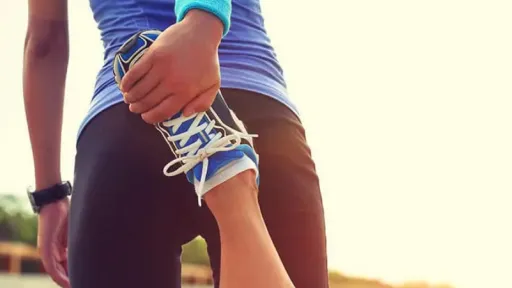 runner stretching leg
