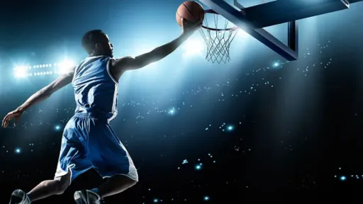 basketball player jumping to net