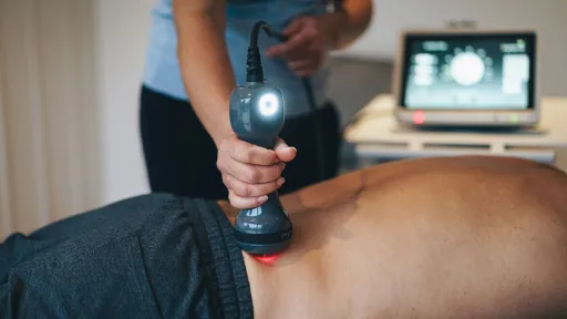 High-Power Laser Therapy for Lower Back and Hip Pathologies webinar title slide or presenter image